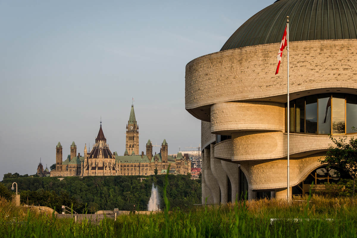 Canadian municipalities themed stock photo. Ottawa green cityscape with govenment buildings and in far background.